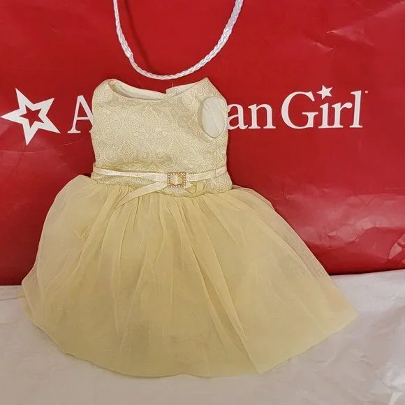 american girl doll gold dress She'll sparkle and shine right along with her Bitty Baby doll in matching  holiday dresses! This set features:Golden Twinkle Dress for Little Girls: A  pretty dress with layers of mesh with sparkly main image 0